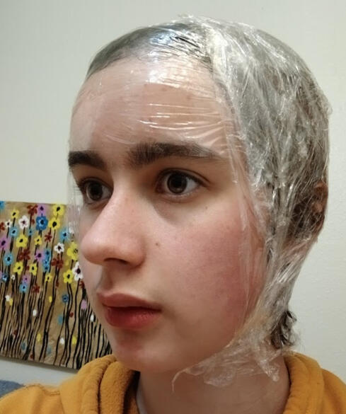 Me with plastic wrap over my head make the head mold