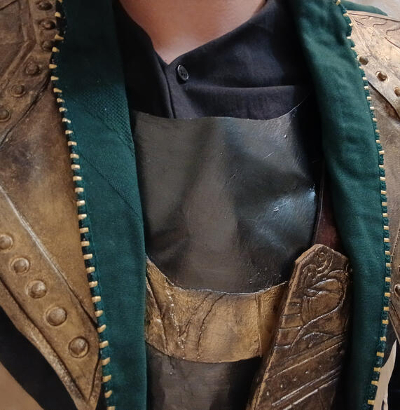 Coat with embellishments, ribs, and lining (2/2)